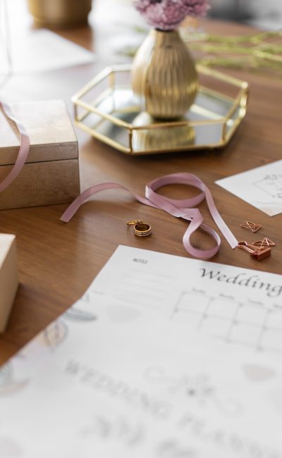 high-angle-wedding-planning-items-arrangement